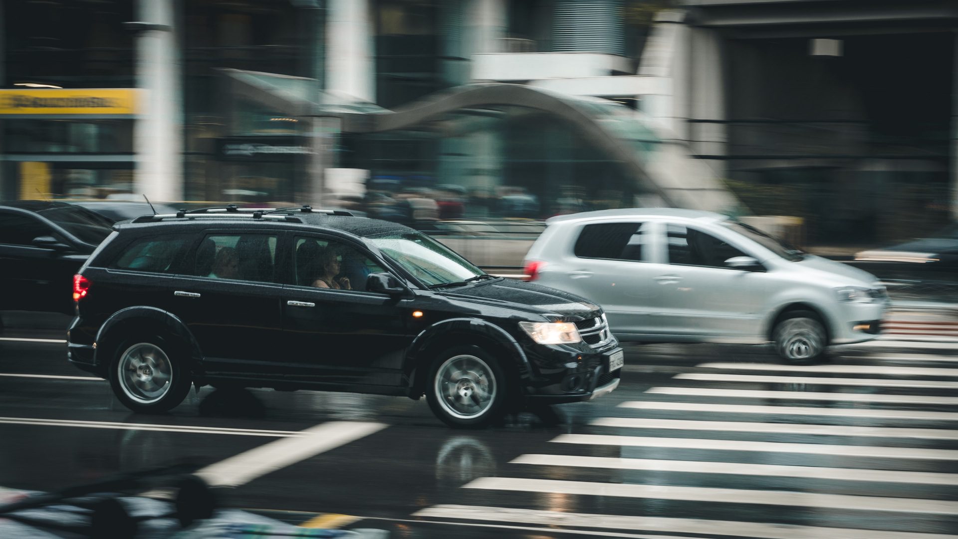 cars driving in suburban area